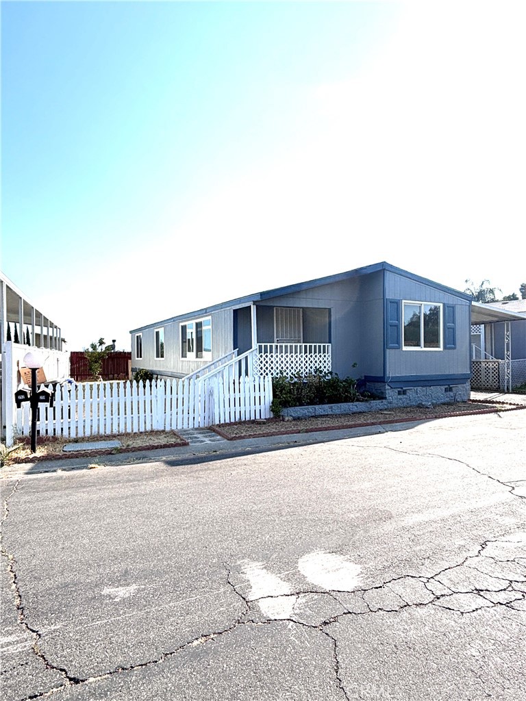 Welcome to this beautifully maintained home in the desirable Jurupa Hills Cascades community. This family friendly and pet friendly neighborhood offers great amenities, including a pool and a clean, peaceful setting. House has been freshly painted inside and out, brand new carpet, and a warm inviting atmosphere. It features a functional kitchen, with plenty of space for everyday living. Windows have been added enhancing natural light, while the rest of the home has been thoughtfully updated to create a cozy and welcoming feel. This home is move in ready, clean, comfortable, and waiting for its new owners to make it their own.