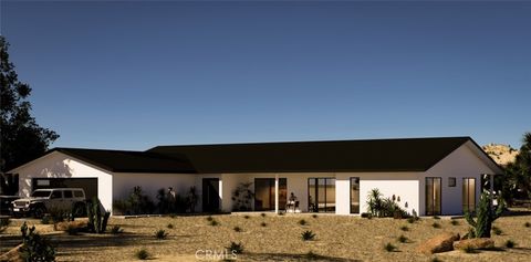 Photo of 57980 San Andreas Rd, Yucca Valley, CA 92284 (MLS # JT26053265)