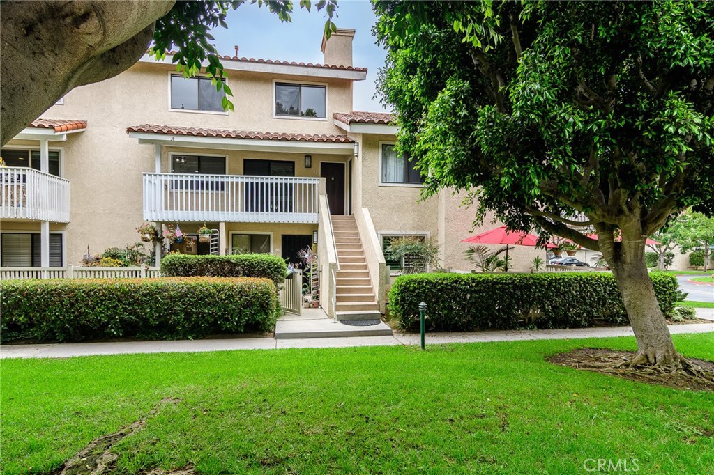 Welcome to 19132 Shoreline Lane #8, a stunning, completely remodeled home in the gated Pierpointe community of Huntington Beach. Updated with a stylish, coastal modern aesthetic from top to bottom, this 2-bedroom, 1.5-bath home offers 1,248 square feet of living space less than 2 miles from the beach. Step inside to the living room featuring brand-new luxury vinyl plank flooring throughout the main level. The spacious living area flows seamlessly into the dining space and the completely redesigned kitchen showcasing quartz countertops, modern cabinetry, and updated fixtures. Upstairs, you’ll find a guest bedroom and a serene primary suite with vaulted ceilings, offering an airy, open feel. The upstairs hall bath has been beautifully remodeled with contemporary finishes, and the downstairs powder room has also been updated. Enjoy excellent amenities in this gated community with access to a pool, relaxing spa, clubhouse, and tennis courts. This home also includes a 1-car garage. At an affordable price for coastal Huntington Beach, this turn-key home offers the perfect blend of style, comfort, and location.