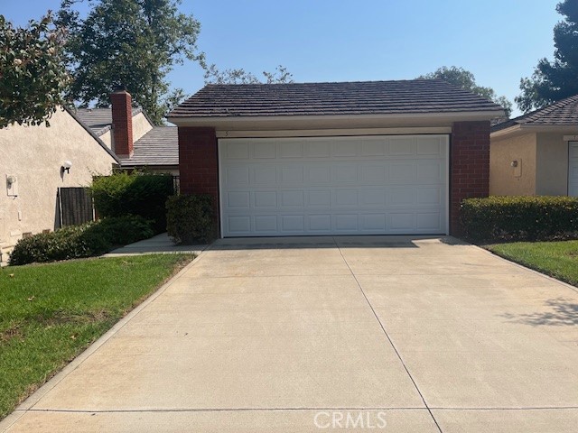 Enjoy pleasant views of the greenbelt while sitting on your patio. This single level Cardiff model In the Terraces is situated on a cul-de-sac and is pleasingly neutral throughout and includes a 2 car attached garage, laundry hookups in garage and a view of the greenbelt. Additional features include a sunny kitchen looking over the front courtyard, a large dining room / living room with fireplace, vaulted ceilings and wet bar with sliding doors to the rear pation overlooking the greenbelt. Primary bedroom is huge with walk-in closet. Secondary bedroom is large with an adjacent bathroom. Exceptional association amenties include pools, spas, playgrounds and clubhouse. With the full driveway and abundant greenbelts, this community feels like a detached home type neighborhood. Close to shopping,405 freeway, Strawberry Farms golf course and within Irvine's top ranked University High boundary.