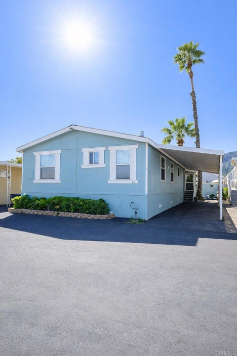 Photo of 32900 Riverside Drive #SPC 109, Lake Elsinore, CA 92530 (MLS # PTP2606366)