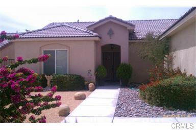 Highly upgraded single family residence located on a prime mountain view lot in Desert Hot Springs. Built 2006, over 1650 sq ft, this property offers: terrific curb appeal, spacious living rm w/vaulted ceilings & fireplace, gourmet kitchen w/custom cabinetry, granite counters, & upgraded appliances, custom 20x20 tile thru-out, huge master suite with large walk-in closets and custom tile work thru-out, private backyard w/blocked walls, palm trees, and beautiful mountain/city lights view! VERY sharp!