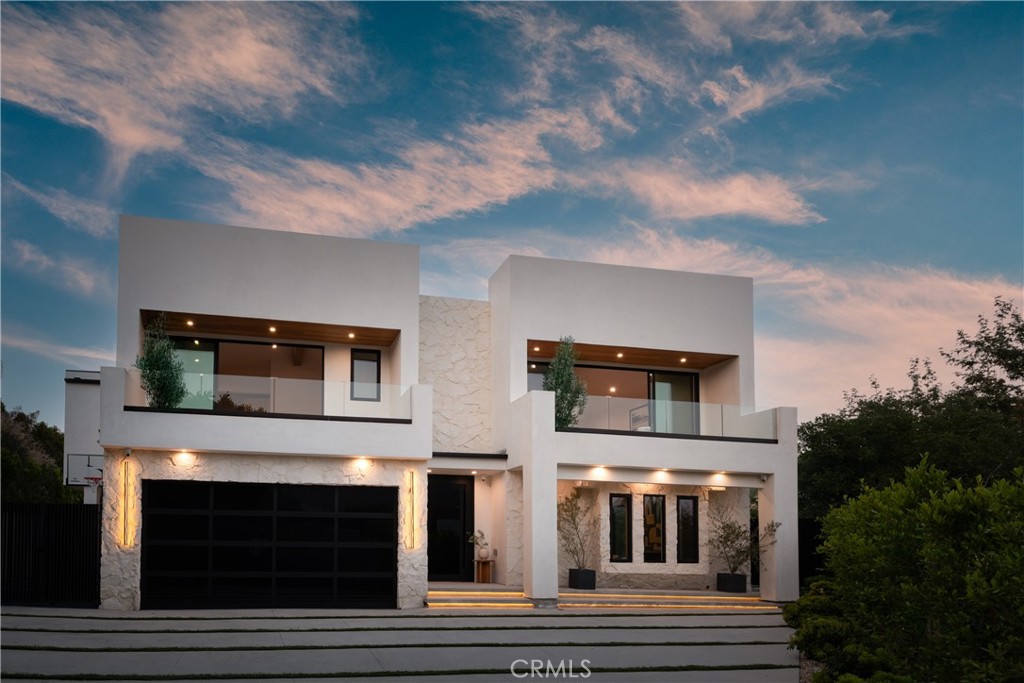 Luxurious modern oasis completely re-built nestled within an exclusive Nichols Canyon location and featuring explosive views. Situated down a long driveway providing utmost privacy and with a driveway large enough to accommodate 5+ cars. Impressive open floor plan and floor to ceiling glass doors allow for ample natural light to flood the home. Custom chef's kitchen displaying Thermador appliances, Taj Mahal countertops and spacious walk in pantry.
Backyard is a true paradise with an infinity pool/spa looking out to explosive views , BBQ center, built-in Fire pit seating, fully covered patio and abundance of grass great for entertaining. Luxurious primary suite with vaulted ceilings, fireplace, oversized dual walk-in closet space and balcony looking out to the views. Spa-like bathroom boasting a walk-in shower, soaking tub and makeup vanity. This modern estate perfectly blends the indoor/outdoor lifestyle with modern comfort and the top notch amenities. Just minutes from the Sunset strip and LA's best restaurants, shops and nightlife.