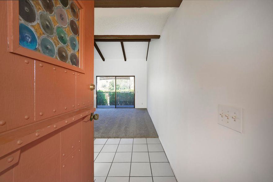 Location, Location, Location! Enjoy the amazing mountain views from this top-floor 1-bedroom condo,  in a sought-after gated community. Featuring  soaring vaulted post and beam ceilings. The spacious floor plan is perfect. Condo amenities, include a covered carport parking spot, tennis and pickleball courts, a vibrant community room, a fully equipped gym, and a relaxing sauna. Not to mention the 3 heated pools, 2 spas, and BBQ area. The HOA allows short-term rentals with 15-day minimums if city permits are available. Your low HOA fee covers Spectrum cable TV, internet, water, and trash and maintenance of all common areas. Freshly painted and carpeted, this condo is move-in ready. Located close to transportation, shopping, and downtown Palm Springs. Pets welcomed too. Don't miss out on this one!