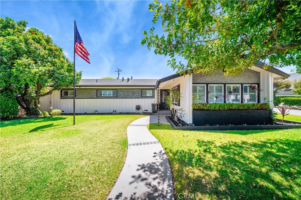 Updated 4-bedroom, 3-bath home offering over 2,000 square feet of well-designed living space. Features include luxury vinyl plank flooring, crown molding, plantation shutters, and freshly painted interiors. The open-concept layout connects the living, dining, and kitchen areas, creating a spacious and functional flow. All bathrooms showcase modern finishes. The oversized laundry room includes custom cabinetry and a built-in pet wash station. The primary suite offers a walk-in closet and en-suite bathroom. Dual HVAC systems provide year-round comfort. The exterior features a landscaped yard, garden bed, gazebo, basketball hoop, gated RV parking, and a two-car garage with built-in storage. Fully fenced for added privacy.
