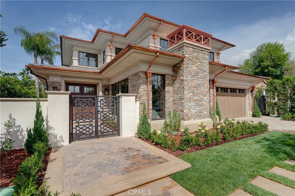 Discover Your Dream Home: A Custom-Built Luxury Retreat in Arcadia
Welcome to your personal sanctuary! This exquisite custom-built residence in Arcadia redefines luxury living, blending high-end craftsmanship with modern elegance. Designed with superior materials and sophisticated finishes, this home offers an unparalleled living experience.
Featuring 4 bedroom suites and 4.5 bathrooms, including a main-level suite for added convenience, this home seamlessly combines comfort and functionality. Whether you need a guest suite, a private home office, or a personal gym, this bright and versatile space adapts to your lifestyle while ensuring privacy and tranquility.
Exceptional Features:
• Gourmet Chef’s Kitchen: A dream for culinary enthusiasts, boasting a spacious center island with quartz countertops, top-tier appliances, and a walk-in pantry.
• Inviting Family Room: Designed for cozy evenings, this space features a stunning marble fireplace, perfect for relaxing and entertaining.
• Elegant Formal Dining Room: French doors open to a secluded backyard, offering a seamless indoor-outdoor experience ideal for hosting guests or enjoying peaceful moments.
• Luxurious Master Suite: A true retreat with a generous walk-in closet and a spa-inspired bathroom. Indulge in a soaking tub, a separate shower, and a dual-sink vanity—crafted for ultimate relaxation.
Perfectly situated just minutes from Santa Anita Mall and award-winning Arcadia schools, this home offers both luxury and convenience. Whether you’re entertaining in the open living spaces or unwinding in your private suite, every detail has been thoughtfully designed to complement your lifestyle.
Don’t miss this rare opportunity to own a masterpiece in one of Arcadia’s most sought-after neighborhoods. Your dream home is waiting!