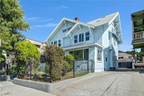 Photo of 2924 S Normandie AVE, Los Angeles, CA 90007 (MLS # TR26223865)