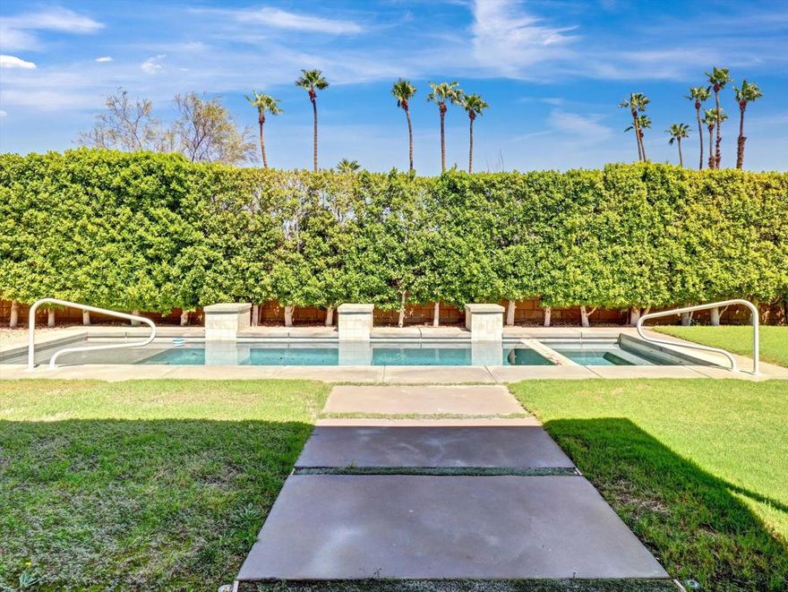 built in 2015, May be the best value for a resort property in Palm Springs.. Over 2500 sq ft.. 3 bedroom, 4 baths (all bedrooms are suites) Large great room with seamless access to enjoy the Resort back yard  with room to build an ADU. Custom pool and spa with 2 covered patios. Spectacular mountain views  with so much space to entertain . Owned solar system, Upgraded powerful A/C units. and a lot more. Property is virtually staged in four pictures