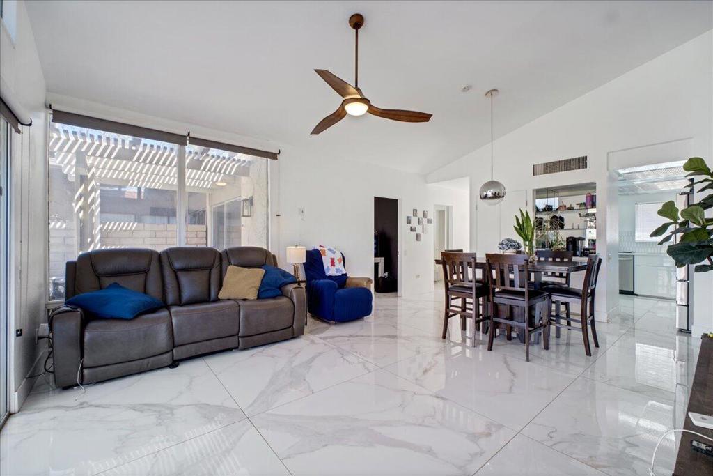 Located within the prestigious Indian Palms Golf Country Club. It's boasting a stunning contemporary design. This Condo features 2 bedrooms and one full bathroom. It's located directly across from the Clubhouse and just steps away from the fitness Center! The kitchen boast sleek, bright modern white cabinetry, complemented by a stylist backsplash and gorgeous quartz countertops. The Bathroom includes marble shower with rain shower head and a nice vanity. Enjoy the sophisticated expense of the stunning 48X48 polished flooring, modern light fixtures and ceiling fans! Close to the Main Entrance and Coachella Fest Fairgrounds. The rear patio offers panoramic vistas of Mountain scenery and a greenbelt. Amazing opportunity for rental income from Coachella Festival, Stage Coach and many other events in the Coachella Valley! Near Casinos, Restaurants and Shopping Stores.