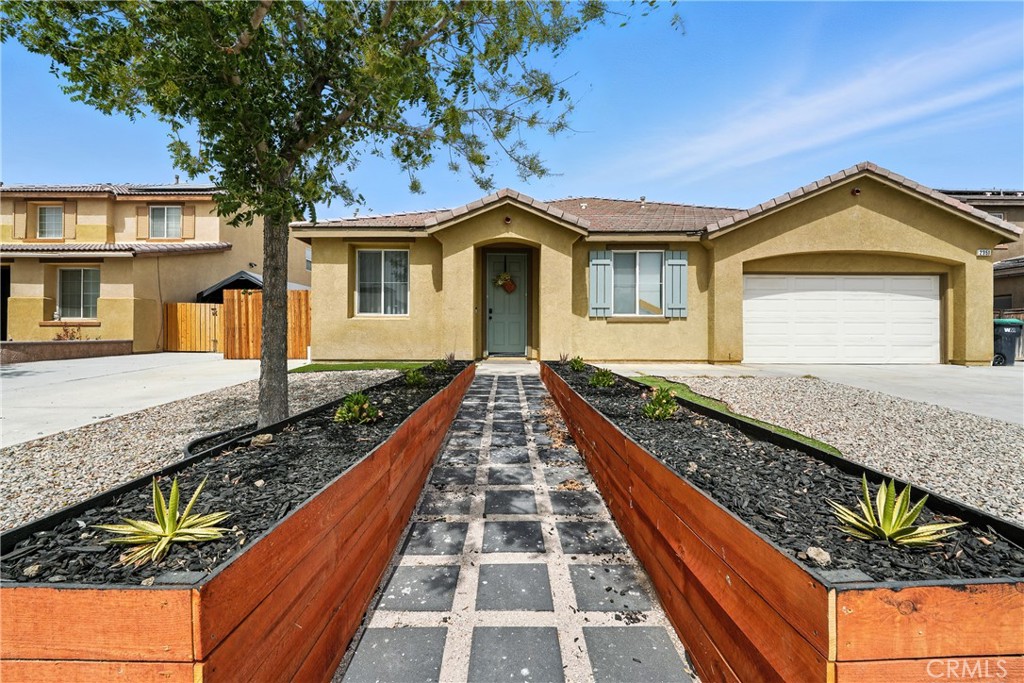 Beautifully updated 2007-built home offering over 2,000 sq. ft. of living space on an 8,700+ sq. ft. lot. Features include a remodeled kitchen, updated flooring, fresh paint, modern fixtures, and a recently renovated attic. The open floor plan provides a bright and functional layout, highlighted by spacious bedrooms and updated bathrooms with double-sink vanities. The primary suite includes a soaking tub and separate shower for added comfort.
A versatile bonus room adds flexibility for a home office or guest use. Outdoor living is enhanced by a large covered patio and a greenhouse, perfect for gardening or relaxation. With thoughtful updates inside and ample space outside, this home is designed for both comfort and everyday living.