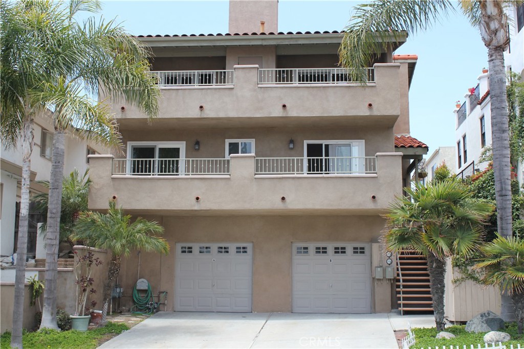 RARE SHORT-TERM RENTAL ZONING OPPORTUNITY – PIER BOWL! This is a truly unique chance to own a legal short-term rental just steps from the sand and iconic San Clemente Pier. Whether you're a savvy investor or looking for your dream beach home, this zoned vacation rental property is a rare find in the highly desirable Pier Bowl district. Located in a well-maintained two-unit condo building with only one shared wall, this beautifully remodeled 3-bedroom, 2.5 bathroom home features white water ocean views from the sunny kitchen and two expansive balconies, including a peekaboo ocean view from the upper level-perfect for enjoying the coastal breeze and entertaining. The updated kitchen features white cabinetry, brand new stainless steel appliances, and granite countertops. The spacious living room includes soaring ceilings, designer paint, and a cozy fireplace. Bathrooms have been tastefully remodeled with new vanities, lighting, tile showers, and a frameless glass shower door. Additional highlights include rich wood laminate flooring upstairs and along the staircase, dual-pane windows and sliding doors, in-unit laundry hookups, tandem two-car parking with an extra-long driveway, and an outdoor shower for rinsing off after beach days. Furnished and move-in ready, this home offers the best of beach living and excellent income potential. This is one of the very few properties in the Pier Bowl with approved short-term rental zoning. Don’t miss this rare opportunity to own a versatile property in one of San Clemente’s most iconic neighborhoods.