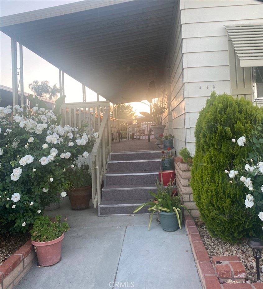 ALL AGES COMMUNITY. WELCOME TO VILLA DEL SOL. BEAUTIFUL MANUFACTURED HOME IN A QUIET GATED COMMUNITY. THE HOME FEATURES 2 BEDROOMS, 2 BATHS, AND AN ADDITIONAL ROOM. SITUATED ON A SPACIOUS 1,344 OF LIVING SPACE. THE KITCHEN HAS A STUNNING LARGE ISLAND WITH MARBLE COUNTERTOP, AMPLE OF CABINETS WITH AN OPEN CONCEPT LAYOUT TO THE DINING ROOM. COZY LIVING ROOM WITH PLENTY OF WINDOWS AND LAMINATED FLOORING. GOOD SIZE BEDROOMS. THE MASTER BEDROOM HAS LARGE DOUBLE CLOSET. INSIDE LAUNDRY ROOM. STEP OUTSIDE YOU WILL FIND A LARGE PORCH WITH AN AMAZING MOUNTAIN VIEW TO RELAX FROM A HECTIC DAY. CLOSE TO SHOPPING CENTERS, SCHOOL AND PARKS. DON'T MISS THIS OPPORTUNITY TO OWN THIS AMAZING HOME!!