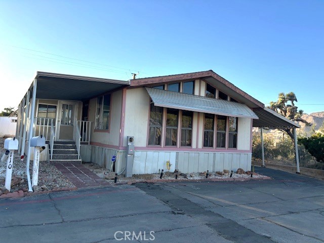 SENIOR PARK- A double-wide mobile home located in Yucca Valley, situated in a senior park. This home features 2 bedrooms and 2 bathrooms, offering comfortable living space. The fact that there are no neighbors behind and right side of the property allows for a more private and serene environment. Yucca Valley is a town in California, known for its proximity to Joshua Tree National Park and its desert landscapes.
Living in a senior park also implies a community-oriented atmosphere, providing opportunities for socialization and shared activities among residents.