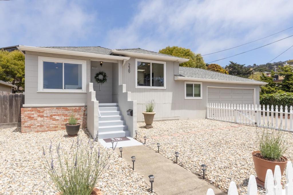 Nestled in the scenic hills of Pacifica, CA, 239 Monterey Rd is a charming single-family home that offers a peaceful retreat with a warm and inviting ambiance. This thoughtfully designed residence delivers both comfort and functionality. The living area provides a welcoming space for relaxation and gatherings. The home features three generously sized bedrooms, each filled with natural light to create a bright and comfortable atmosphere. Both the kitchen and bathrooms have been tastefully updated, offering modern finishes and added convenience for everyday living. Situated on a large, flat lot, the property offers ample outdoor space surrounded by lush greenery perfect for enjoying Pacificas mild climate in privacy. Conveniently located close to local amenities, scenic trails, and coastal attractions, 239 Monterey Rd combines the best of serene living with everyday convenience. Whether you're looking to settle down or invest in a vibrant coastal community, this home is full of potential and ready to welcome you.