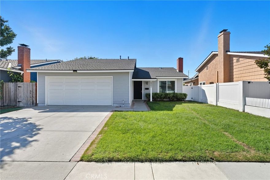 Welcome to this beautifully updated 3-bedroom, 2-bathroom home situated in a highly sought-after, low-inventory pocket of Huntington Beach. Offering just under 1,150 sq. ft. of comfortable living space, this move-in ready gem features a spacious attached two-car garage, a welcoming front yard, and a recently remodeled backyard with fresh sod—perfect for outdoor entertaining or relaxing in the sunshine. Step inside to discover a thoughtfully updated interior, featuring stylish new vinyl plank flooring throughout the main living areas and brand-new carpet in all bedrooms. The kitchen boasts stunning new quartz countertops, brand-new stainless steel appliances, stainless steel basin sink, and sleek recessed lighting with an open floorplan that is ideal for family gatherings. The functional layout includes two guest bedrooms that share a refreshed hallway bathroom with a convenient shower/tub combo, while the primary suite offers a walk-in tiled shower and contemporary finishes. Located just steps from a community park and Huntington Lake, this home also offers easy access to local recreation, shopping, and dining.
