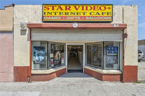 Photo of 8312 S Broadway, Los Angeles, CA 90003 (MLS # DW26228696)