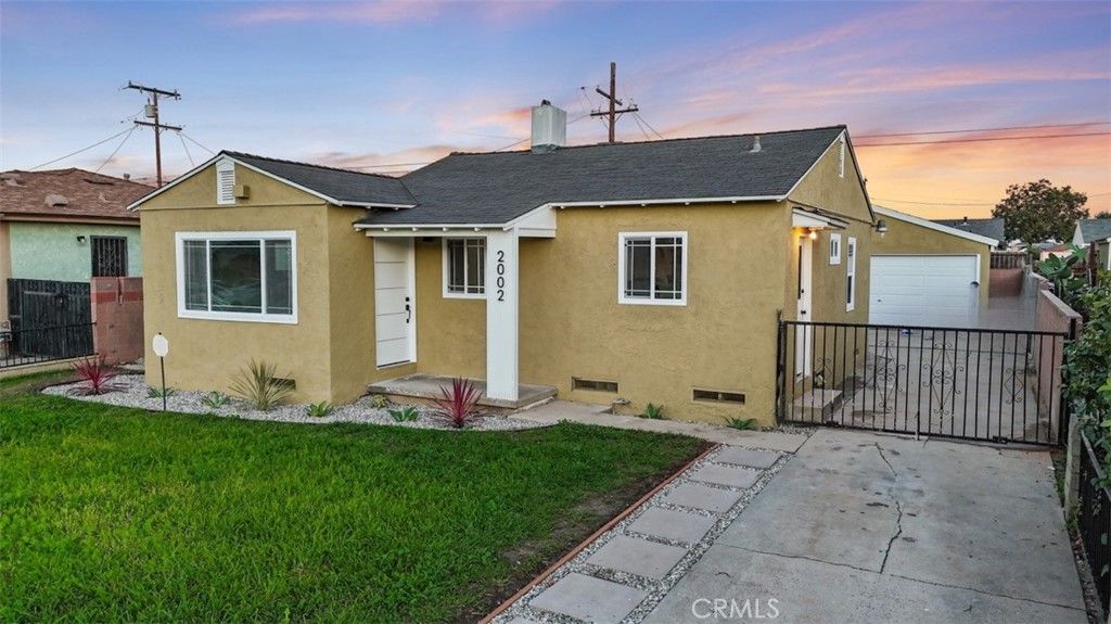 Photo of 2002 N Salinas Ave, Los Angeles, CA 90059 (MLS # SB25266153)
