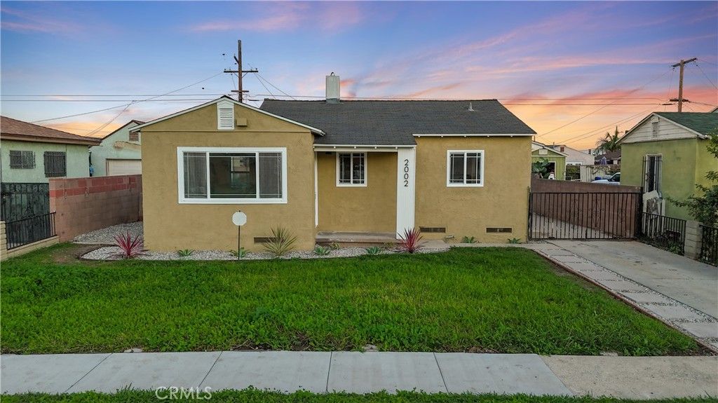 Photo of 2002 N Salinas Ave, Los Angeles, CA 90059 (MLS # SB25266153)