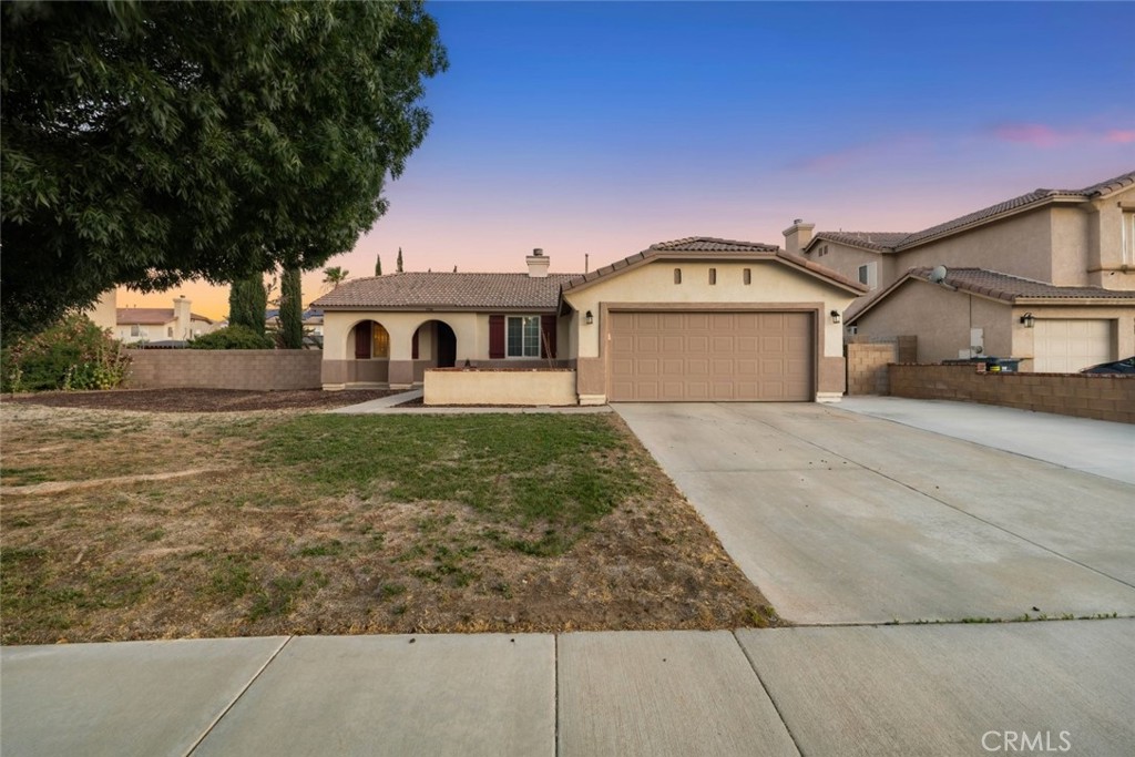 Welcome to this beautifully maintained single-story home in a quiet Lancaster neighborhood. Offering 3 bedrooms, 2 bathrooms, and approximately 1,350 square feet of living space, this home is thoughtfully designed for comfort and functionality. Inside, you'll find a spacious open-concept layout featuring a dedicated dining area, a warm living room with a fireplace, and a unique built-in home theater setup—perfect for movie nights or entertaining guests. The upgraded kitchen is a chef’s delight with granite countertops, custom tile backsplash, and ample cabinetry.
The primary suite includes dual vanities and a private en-suite bath, while the additional bedrooms offer versatility for guest space, work-from-home, or hobbies. The backyard provides a clean slate for outdoor living, with a generous patio space and potential for a garden or lounge area. Additional highlights include tile and carpet flooring throughout, a 2-car garage, and a well-maintained front yard. Conveniently located near schools, shopping, and commuter routes, this home is a fantastic opportunity in the heart of Lancaster.
