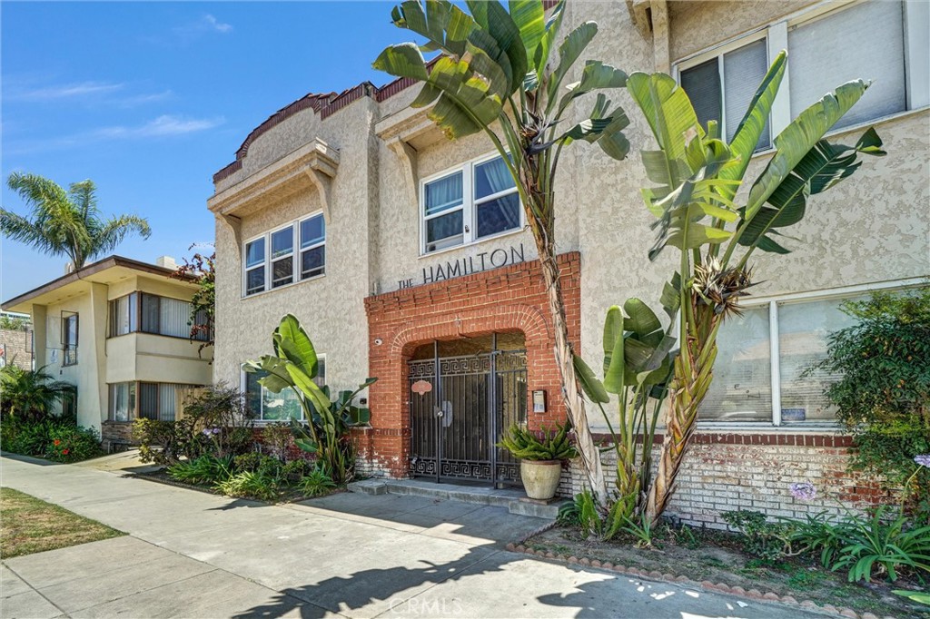 Sweeping ocean views, Oceanfront sundeck, Private patio, Private entrance, Bright open-concept layout beautifully appointed with refined brass details, marbled granite countertops, & new appliances.
Welcome home to 1616 E Ocean Blvd #6, a coastal gem in the heart of Long Beach’s vibrant Alamitos Beach neighborhood. This stylish 2-bedroom, 1-bath condo isn’t just a home—it’s a lifestyle for those who crave the perfect balance of modern design, beachside calm, and city energy. Follow the lush garden breezeway to your private entrance and step into a bright, open-concept layout. The first floor connects the living and dining areas to a modern kitchen featuring granite countertops, stainless steel appliances, extra storage, and an acoustic wood panel wall. Rear door leads to a private patio, ideal for sipping morning coffee or unwinding after sunset. Upstairs, two bright and spacious bedrooms offer custom closets maximizing storage and flexible space to create, rest, or recharge. The updated bathroom features a walk-in tile shower with dual shower heads, stone finishes, and refined brass details. Beyond your front door, enjoy all the benefits of coastal living. Fire up the grill on the oceanfront sundeck, take in sweeping ocean views, or watch the sun dip behind the Queen Mary. Beach access is just steps away, connecting you to a four-mile waterfront path from Shoreline Village to Belmont Shore. Stroll to local restaurants and entertainment or hop on the free Circuit ride for easy city exploring. With public transit close by, you might find yourself driving less and living more. This is a wonderful opportunity to reside on the beautiful California coast—modern, effortless, and undeniably beachy. Live where others vacation! Available furnished. No pets, no smokers.