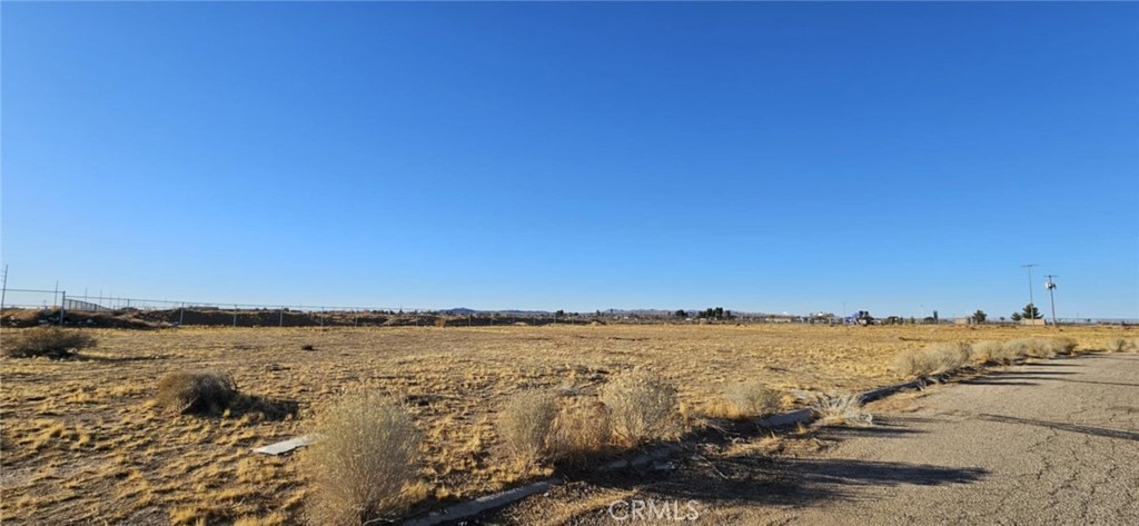 Here's your opportunity to own a residential lot in Adelanto with paved street access, public water available, and power nearby on Bartlett Ave. Located in a growing area with plenty of potential. The neighboring lot is also for sale! (APN:0459-491-18-0000). Buy one alone OR place one offer for both; expand your space and save on closing costs! Don’t miss out—drive by and check it out today! APN:0459-491-19-0000. Latitude:34.580294, Longitude:--117.426471.