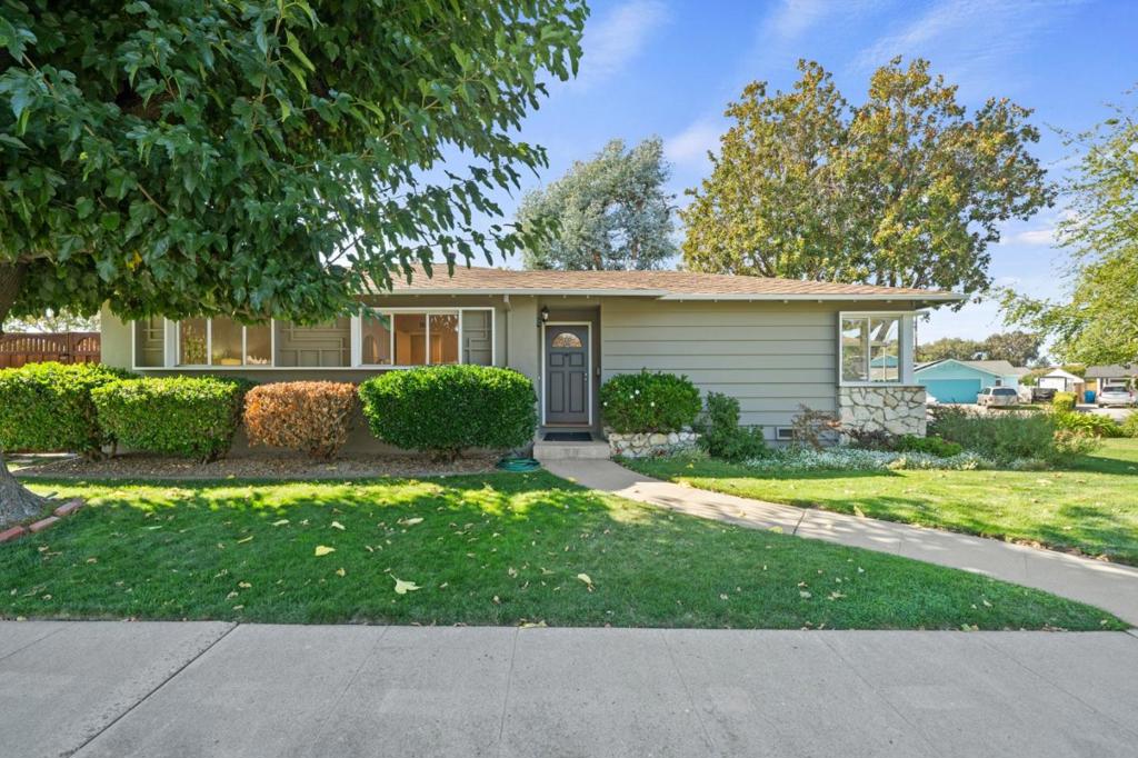 Welcome to 3517 Oxford Drive, a charming 3-bedroom, 2-bathroom home on a prime cul-de-sac corner in one of Santa Clara's most desirable neighborhoods. Just moments from Apple Park and Kaiser Santa Clara, this 1,462 sq ft residence blends thoughtful updates with everyday convenience. Inside, a bright living room with refinished hardwood floors leads to a separate family room with luxury vinyl plank flooring, wood-burning fireplace, and custom built-ins. The eat-in kitchen with maple cabinets and solid surface counters offers generous storage and workspace, ideal for casual meals or entertaining. Both bathrooms have been tastefully remodeled with features like a dual vanity, subway tile, and modern fixtures. Additional highlights include fresh interior/exterior paint, recessed lighting, newer forced air heating and water heater, and updated 200 AMP electrical with EV charging. The attached 2-car garage features laundry with washer/dryer, utility sink, and water softener. Outside, enjoy the large, private yard with mature landscaping, garden, patio, and new paver driveway. Minutes from top schools, shopping, dining, transit, and major tech employersthis beautifully updated home offers both a quiet, peaceful setting and unbeatable convenience. Its simply a must see!
