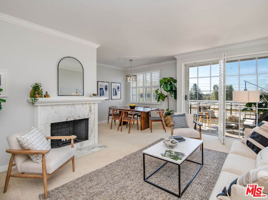 Beautiful prime area of Westwood. This beautiful updated  2 bed, 2 bath is 1,149 sqft. condo with views that must be enjoyed from the oversized balcony at sunset. The condo is located on the top floor of a secure four-story building . The amenities include underground parking with 2 tandem parking spaces. The parking area has secure access to elevator and building as well as assigned lockable storage. Other amenities also included are luscious green courtyard, pool, spa, and gym. Enter the home to find a warm and spacious naturally lit home. The home features plantation shutters throughout, spacious bedrooms and beautiful must see bathrooms. The Master bedroom features a walk-in closet, and en suite, and views into the courtyard. The kitchen It is also brightly lit of natural light emanating from the oversize window, a breakfast nook and its own laundry alcove. The living room features a fireplace and access to the balcony, it is adjacent to the dining area with wet bar.