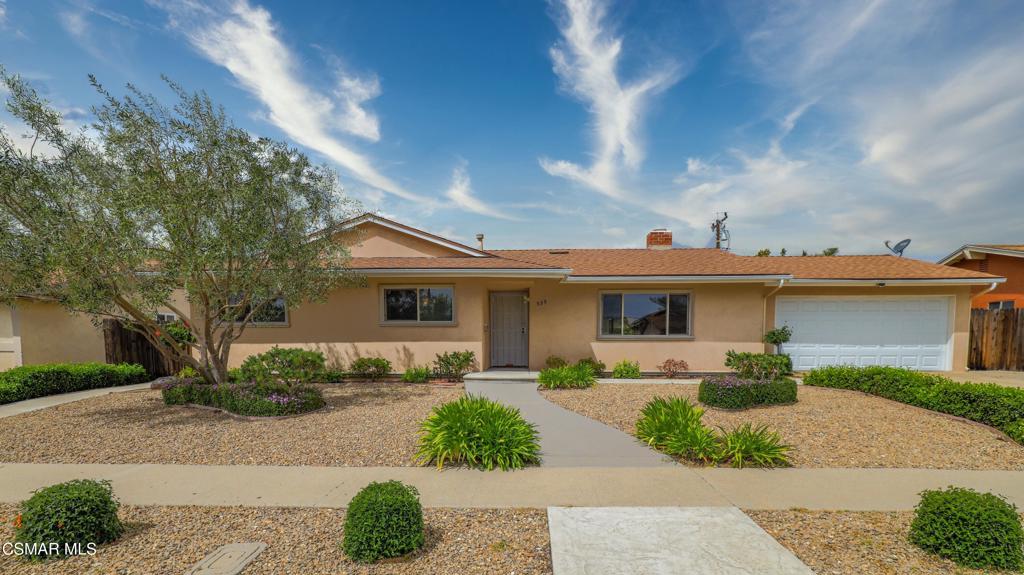 Welcome to this charming Casa Conejo single level home in Newbury Park. 3 bedrooms, 2 bathrooms. Features include dual pane windows, smooth ceilings, bullnosed corners, recessed lighting & tile flooring. Kitchen offers refaced cabinetry & SS appliances. Family room has a cozy fireplace. Some of the upgrades include replaced roof, furnace-A/C, electrical panel, front garage door & interior sewer lines have been relined. Garage has added beam with hoist set-up, along with convenient pull thru garage to rear yard, perfect for the car enthusiast. Situated on a private lot with fruit trees, covered patio and additional storage sheds. Front yard has drought tolerant landscaping & stamped concrete walkway. Centrally located to schools, shopping & Fwy access.