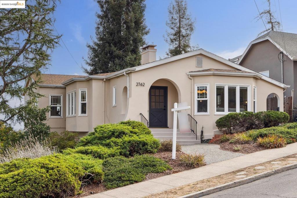 Handsome Maxwell Park Craftsman with many updates throughout. Wonderful floor plan with large formal rooms and charming built ins. Most upstairs room boasts sunny wide vista of the Oakland hillside. Wonderful grand formal rooms and spacious bedrooms. The large kitchen is wonderfully refreshed and comes with new frig, washer/dryer. Downstairs is the large 4th bedroom, second bathroom, ready made bar/kitchen set up -- it is ideal for a possible in-law or ADU set up. In addition, on the same level, there is also a very spacious work-shop which can be easily expanded for additional living space. Both bathrooms have been updated. Spacious low maintenance landscaped garden & wonderful brick patio. Melrose Leadership Academy - a very sought after TK - 8th Spanish Immersion School is near by.