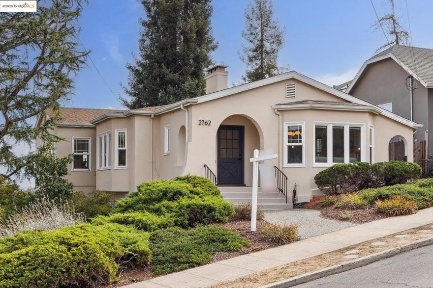 Handsome Maxwell Park Craftsman with many updates throughout. Wonderful floor plan with large formal rooms and charming built ins. Most upstairs room boasts sunny wide vista of the Oakland hillside.  Wonderful grand formal rooms and spacious bedrooms. The large kitchen is wonderfully refreshed and comes with new frig, washer/dryer. Downstairs is the large 4th bedroom, second bathroom, ready made bar/kitchen set up -- it is ideal for a possible in-law or ADU set up.  In addition, on the same level, there is also a very spacious work-shop which can be easily expanded for additional living space. Both bathrooms have been updated.  Spacious low maintenance landscaped garden & wonderful brick patio.  Melrose Leadership Academy - a very sought after TK - 8th Spanish Immersion School is near by.