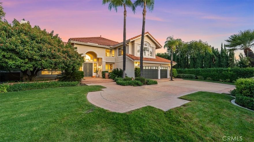 It doesn't get any better than this! This is the development's crown jewel, a statement home built by JM Peters on prestigious Euclid Avenue in North Upland. This home offers a brilliant floor plan, offering open and expansive spaces. As you approach the home, you will be impressed by how far back it sits off the street. There is a circular driveway that can accommodate four or more vehicles. The entire presentation of the front of the house exudes beauty and luxury. Enter through the double doors to find soaring ceilings and lots of windows that allow for natural light. The home is open and bright in every room. The formal living and dining rooms are perfect for special occasions. However, as in most homes, the kitchen is the heartbeat of the house. There you will find modern finishes, high-end appliances, and an open and inviting area that really creates a great room effect. The first level also includes a home office/library with custom built-ins. Additionally, there is a downstairs, second primary suite that is ideal for a nanny, granny, or guests. Upstairs, the primary suite is luxurious! It is very spacious and feels like you have found your own private retreat. It offers a blend of modern luxury and timeless calm. The elegant details and tranquil views invite you to slow down and savor the life you have created. The secondary bedrooms and baths are also lovely and spacious. The game room is perfect for a friendly game of pool, a home gym, or a teen's gathering space. When stepping outside, you will find a resort-inspired backyard. Lush and mature landscaping and elegant appointments frame it. The sparkling pool and spa will make summer days fun for all. The lush and expansive grass area is the perfect place for al fresco dining and outdoor entertaining. Located at the foothills of Mt. Baldy and next to the prestigious Euclid Avenue walking path, outdoor activities are at your doorstep. You are also close to the Colonies shopping center, where you can find restaurants, a variety of retail stores, and access to the 210 freeway. This location is perfect for commuters and has no negative influence from freeway noise. You must hurry to see this home. It is a one-of-a-kind, exceptional residence. A home like this rarely graces the market. This is the opportunity for the person who recognizes something extraordinary and takes action to make it theirs. Don't wait!