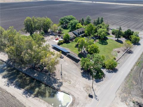 Photo of 15686 Cozzi Avenue, Dos Palos, CA 93620 (MLS # MC26082600)