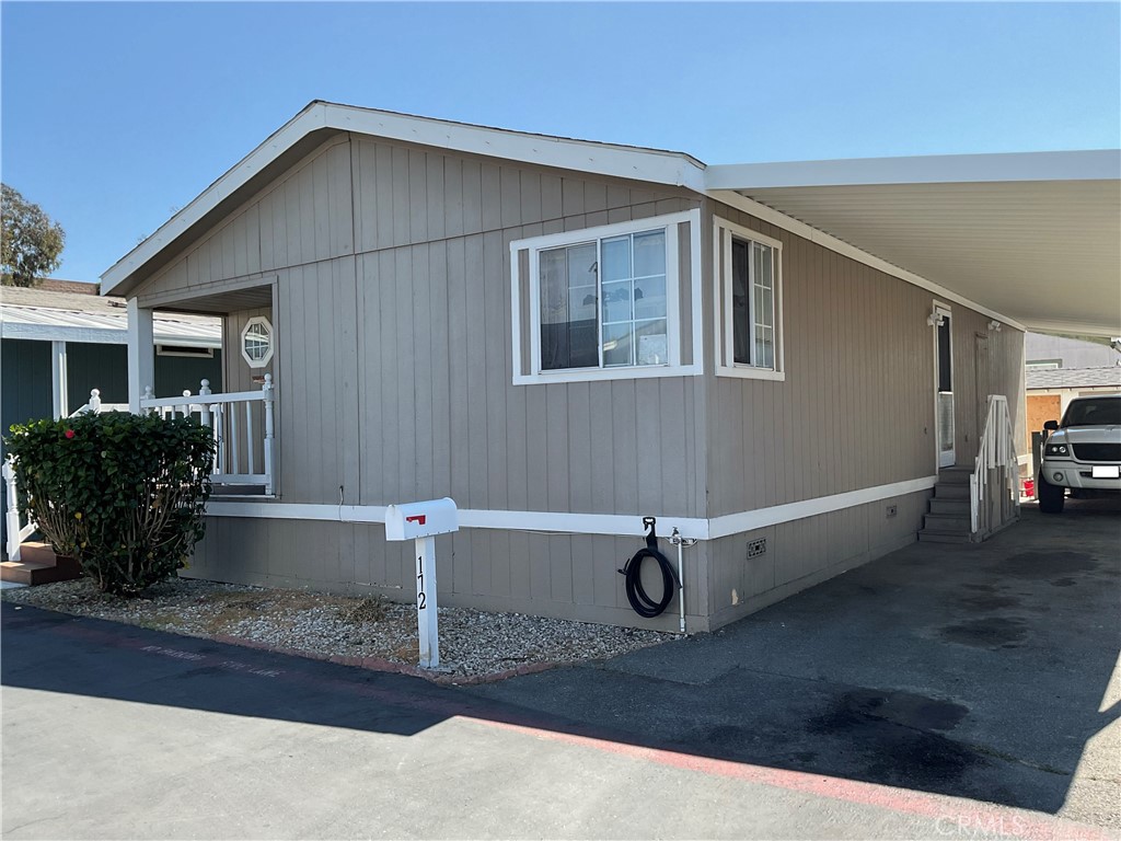 3 Bedroom/2 Bath move in ready mobile home, shingled roof, nice and big back yard rear located in all ages community.