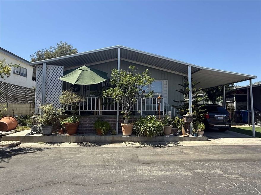 Home located at 8811 Canoga Ave. 543, Canoga Park, CA 91304. The property offers living areas, a kitchen, and bedrooms designed for practical use. The backyard allows space for outdoor activities and gatherings. Located near schools, shopping centers, and major highways, this home provides convenience for daily needs. Suitable for individuals seeking a functional space in a good location.