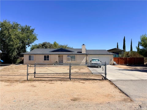 Photo of 12839 Running Deer Road, Apple Valley, CA 92308 (MLS # HD26207522)