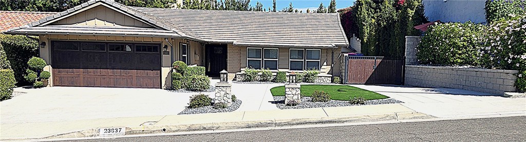 ONCE IN A LIFETIME TURNKEY HOME!! Great curb appeal that carries over to the homes inside. Entertainers dream home with gourmet kitchen featuring 3 convection ovens, walk- in pantry and custom cabinets throughout the whole home. No expense spared as this home has blown in foam insulation on all exterior walls and vaulted ceiling areas. Plumbing updated to above ground with whole home water filtration system (no salt). All new re-vented HVAC system and new condenser unit with 16 seer rating, and Ecobee app controlled thermostat. Emergency generator to run your whole home that automatically switches over when the power goes off in the area. Whole house fan that saves you in AC bills to cool the home in the evenings with automatic settings. Italian made 8" wide plank porcelain flooring throughout the home with a state of the art moisture barrier underneath that keeps the tile from becoming freezing cold during the cooler months. Oversized door and floor molding, and crown molding throughout the home. Solid core panel doors with custom hardware. Recessed lighting in all rooms with Lutron switches that all are controlled by an app on your phone. In ceiling speakers with Sonos system receivers in every room, outside patio and garage, that can be individually controlled by phone app. Cat6 cabling in all rooms with extra lines in office. Primary bedroom has a huge walk-in closest with custom organizer and pull rods. All the widows are dual pane Milgard superior, with all covered windows featuring top of the line Sunburst Plantation Poly wood shutters. Central vacuum system with convenient dust-vac pan in kitchen area and is very hypoallergenic as the dust goes out to the main unit in the garage. Nice and quiet as well. Commercial grade surveillance color night vision cameras all over the perimeter and interior areas. Garage features epoxy floors , led ceiling lights, and Tesla home charger with insulation in all the walls. The garage door is a custom, super insulated with a closed aluminum backing. The rear yard is a great entertaining space or staycation area that includes a 6 burner 40" BBQ , double side burners, warming drawer and 30" built-in bar sink, Chicago wood burning pizza oven. You can relax by the the fireplace or in the oversized mega jet spa. if you would like a pool, the community pool is just a 1 minute walk-away. Rear yard RV paring up to a 44' RV with a 10' double gate opening and 30 amp RV hook up. The front RV entry driveway is 25'.
