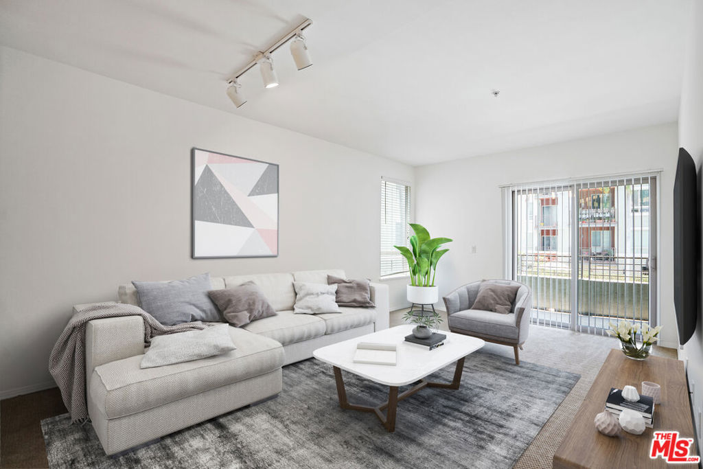Step into the largest one-bedroom floor plan at the sought-after Savoy Condominiums, perfectly positioned as an end unit overlooking the serene pool courtyard. Residence 241 offers a bright, open layout with defined living and dining areas, an airy kitchen ideal for entertaining, and a covered balcony with tranquil treetop views. The generously sized bedroom includes a walk-in closet, while the oversized bathroom features in-unit laundry for added convenience. One assigned parking space included.Savoy is your urban oasis in the heart of DTLA's Little Tokyo and Arts District, offering resort-style amenities: sparkling pool and spa, rooftop deck with skyline views, fully equipped gym, elegant clubhouse, conference room, business center, zen-inspired courtyards, 24/7 attended lobby, security, and ample guest parking.Enjoy vibrant city living with top-tier restaurants, art galleries, boutiques, and nightlife just outside your door.