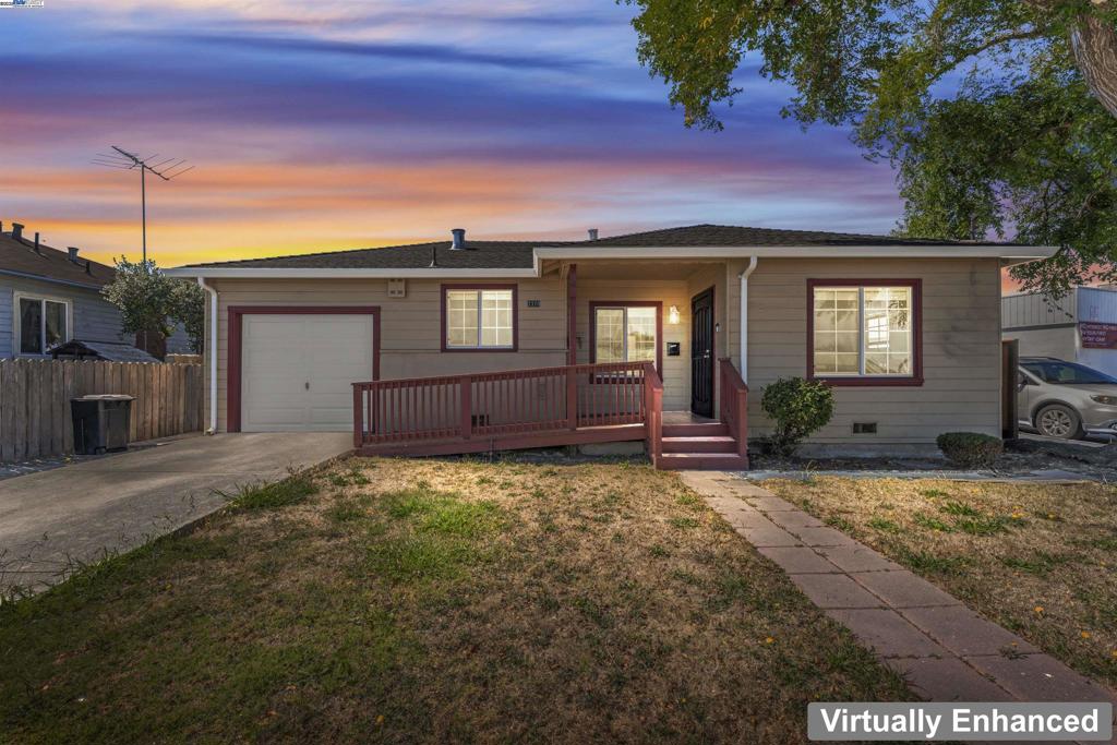 Welcome to this charming 3-bedroom, 2-bath home offering 1,126 sq. ft. of comfortable living space on a generous 5,000 sq. ft. lot. Charming single-story home with inviting curb appeal. A welcoming covered front porch, and a gently sloped accessibility ramp leading to the front door. The property includes a one-car garage, a wide driveway for additional parking, and a fenced side yard. Mature trees provide shade and character, while the spacious front yard offers potential for landscaping or gardening. Convenient corner location with easy street access. The inviting primary suite features a private bath and direct access to the backyard. The large yard is a true canvas, complete with a mature plum tree and plenty of space for gardening, gatherings, or future ADU potential.Enjoy a functional layout, natural light, and space for indoor-outdoor living. Conveniently located near parks, shopping, schools, and freeway access—perfect for commuters and those who love the Bay Area lifestyle.