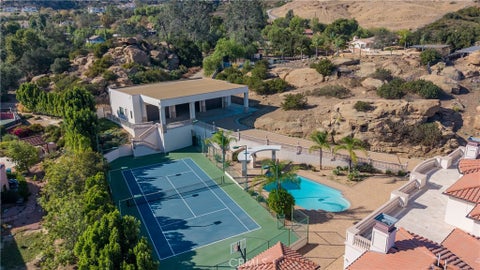 Photo of 11817 Macoda LN, Chatsworth, CA 91311 (MLS # SR26228520)
