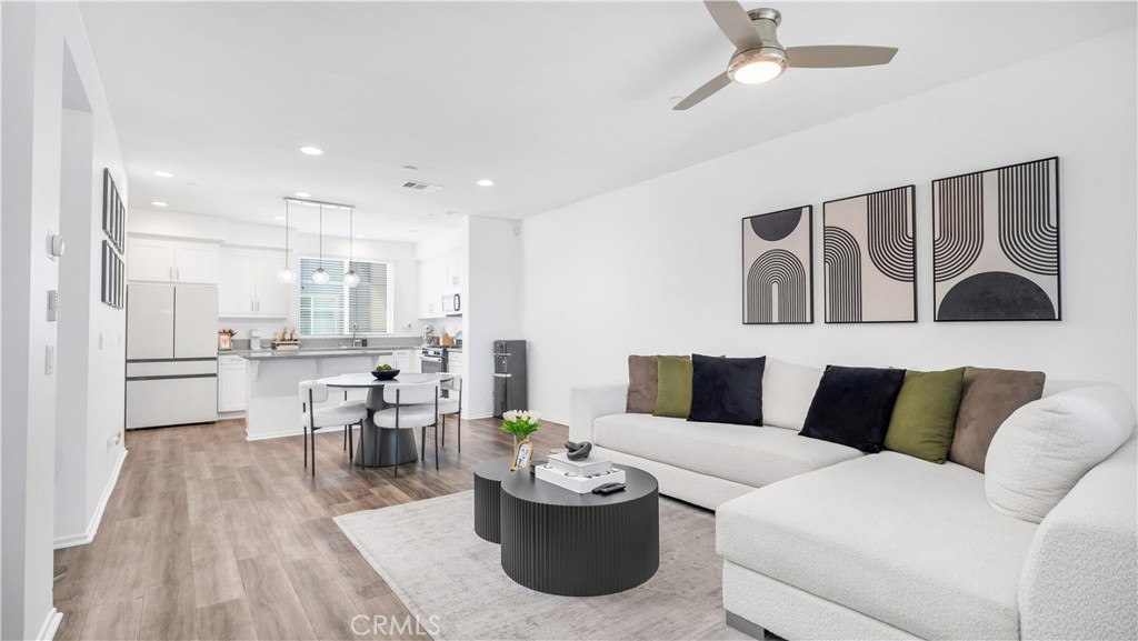 Welcome to 1017 Savi Dr #103 — a highly sought-after 4-BEDROOM, 4-BATHROOM MODERN TOWNHOME in Corona’s GATED Boardwalk community. This RARE, TRI-LEVEL floor plan offers over 1,600 SQFT of OPEN-CONCEPT LIVING with thoughtful upgrades throughout.
The FIRST FLOOR features a FULL BEDROOM + BATH — perfect for guests, office, or home gym. On the MAIN LEVEL, enjoy a BRIGHT & AIRY LIVING SPACE with WHITE SHAKER CABINETS, QUARTZ COUNTERTOPS, STAINLESS STEEL APPLIANCES, and a LARGE CENTER ISLAND built for entertaining. A COVERED BALCONY, LAUNDRY ROOM, and GUEST POWDER BATH add even more function.
Upstairs, the PRIMARY SUITE offers a WALK-IN CLOSET, DUAL-SINK VANITY, and ample natural light. Two more bedrooms and a full bath complete the third level. Smart-home touches include a DUAL-ZONE NEST THERMOSTAT, TANKLESS WATER HEATER, RECESSED LIGHTING, CEILING FANS, and a DIRECT-ACCESS 2-CAR GARAGE.
Boardwalk offers LOW HOA, RESORT-STYLE AMENITIES: POOL & SPA, BBQ AREA, TOT-LOT, and DOG-FRIENDLY GREEN SPACES. Commuter-friendly location with quick access to the 15 & 91 FWYS, METROLINK, CRESTA VERDE GOLF COURSE, and top-rated schools.
This is the one - a high-function, LOW-MAINTENANCE HOME in a PRIME CORONA LOCATION.
Schedule your private showing today!