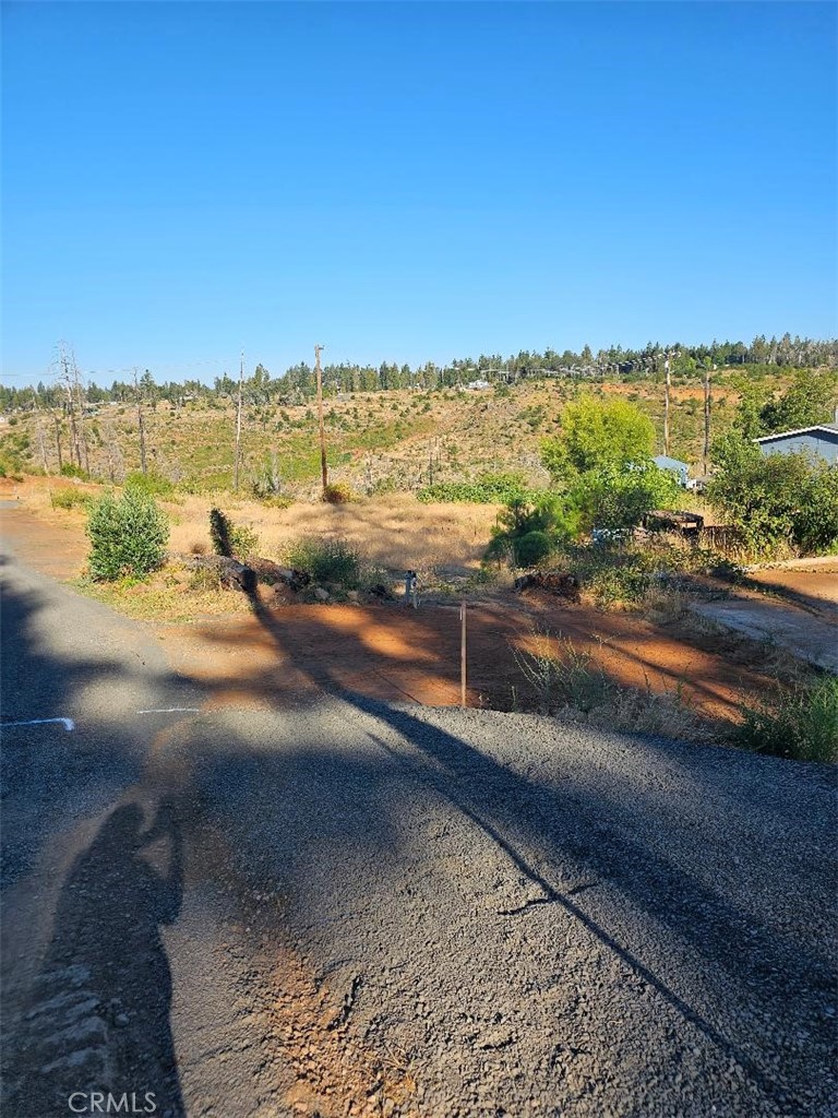 This is a double lot, the views are spectacular. There was a 2 bedroom 2 bath previously with a loft. The septic is unknow. On the back of the lot was a 30 x 36 shop, the concrete slab still exists. Your close to the store and short drive to other shopping.