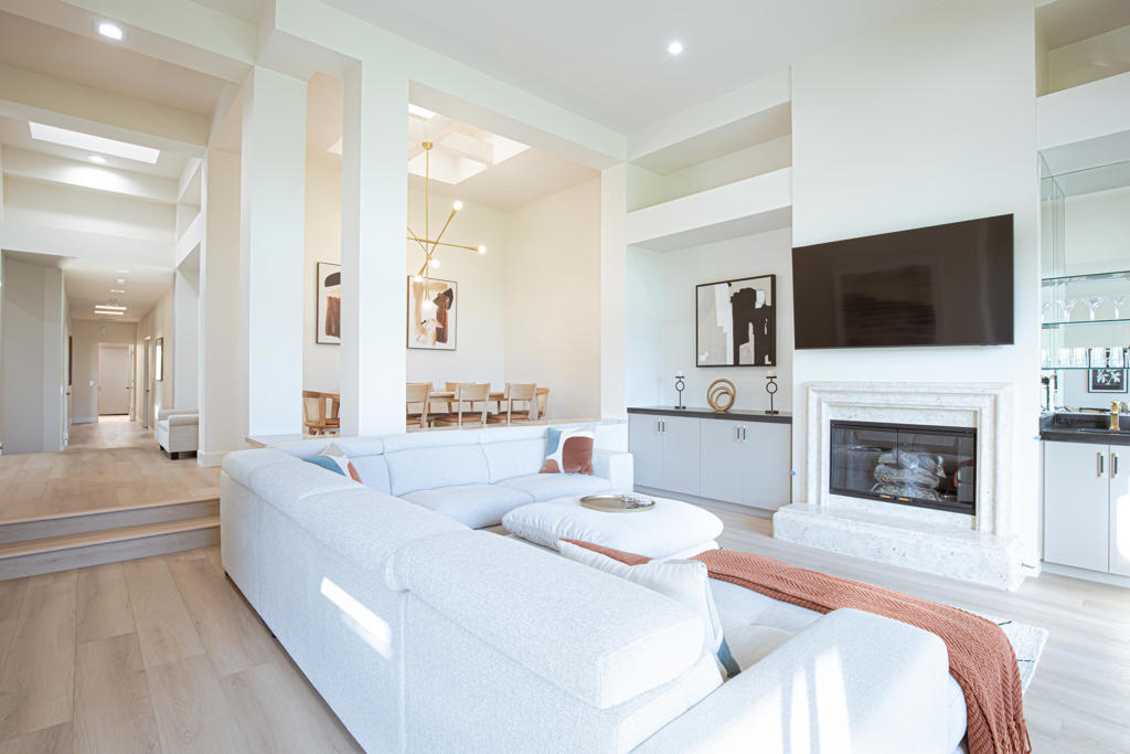 Available December 2025 - April 2026 at $11,000/month + monthly caps on electric and gas. Also available July 2025 through October 2025 at $5,000/month + utilities. Landlord pays monthly HOA dues that include cable and internet. Renovated contemporary design home with stunning south golf and lake views! This Acacia 5 floor plan offers breathtaking panoramic views of the lake, mountains, and Grove #7, 1 of 2 Arnold Palmer-designed courses at Indian Ridge Country Club in Palm Desert. The 3-bedroom, 3.5-bathroom condo is just one house away from a beautiful community pool and spa. You will be the first to enjoy the new flooring, stainless steel appliances, new quartz countertops, new large flat screen TVs and furnishings, new AC, new security alarm, and all new lighting. The back patio, with new outdoor furnishings and electric awnings with new Sunbrella fabric, is accessible from both the living and dining areas, perfect for entertaining or relaxing while enjoying the expansive views. The living room includes a fireplace and wet bar, and the kitchen features counter seating, an island, and a small desk area. The primary bedroom has a king bed and a large slider overlooking green foliage creating a sense of calm. The en-suite bathroom offers a soaking tub, shower, dual vanities, separate water closet as well as a large walk-in closet. Both guest bedrooms have been completely remodeled and are also en-suite, each equipped with a designer tiled shower, dual sinks & separate water closet. Landlord's club membership available for tenant use with membership approval with 3 month minimum. Utilize the Fitness Center with the latest strength and cardio equipment, an active schedule of classes, a full-service day spa, and three restaurants with outstanding food. Indian Ridge Country Club offers a never-ending social calendar and is one of the desert's premier private country club communities, centrally located in the Palm Springs area, close to Interstate 10, El Paseo, and the airport.