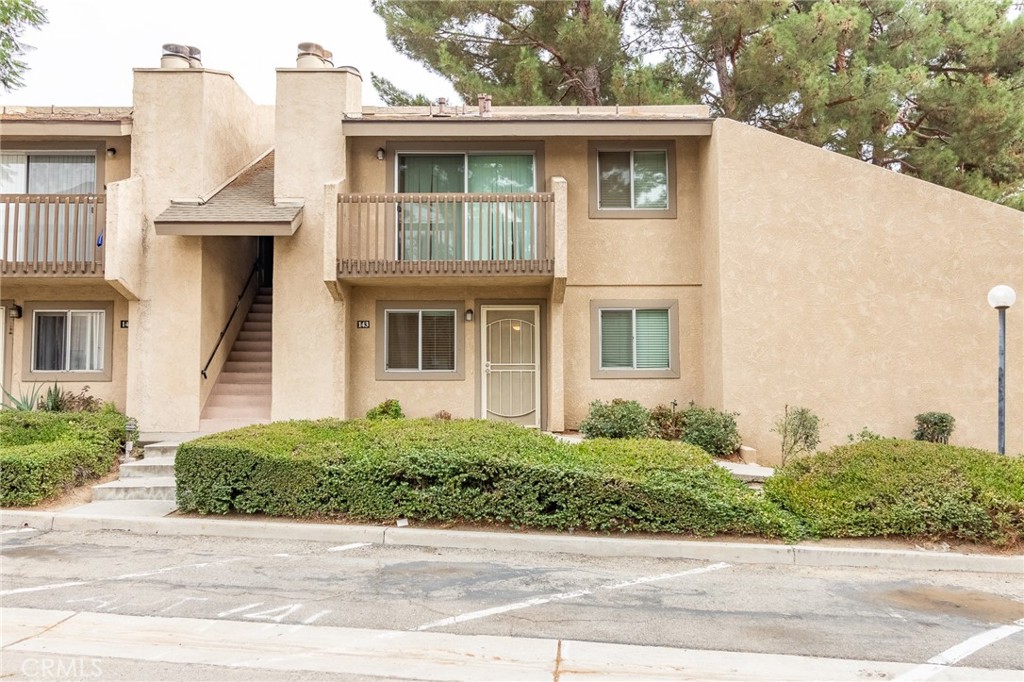 Welcome to this wonderfully updated downstairs condo in a gated community in the city Colton! Originally constructed in the mid-1980s and completely updated in 2018 including electrical and plumbing, this 2-bedroom, 2-bath home offers 914 square feet of turnkey living space. Featuring an open floor plan with tile flooring throughout, a modern kitchen with white cabinets, granite countertops, and a gas range, this home is ideal for comfortable, low-maintenance living. The spacious primary suite includes a walk-in closet, ensuite bath, and sliding glass door leading to a private patio.
Enjoy convenient in-unit laundry with stackable washer and dryer, central A/C, and a single-car attached garage with direct access, plus an additional assigned parking space. The well-maintained gated community offers fantastic amenities including a pool, spa, tennis courts, and scenic walking paths. Close to the 10 and 215 freeways, shopping, and Fiesta Village Family Fun Park makes this home ideally centrally located. Please note: this complex is not FHA or VA approved.