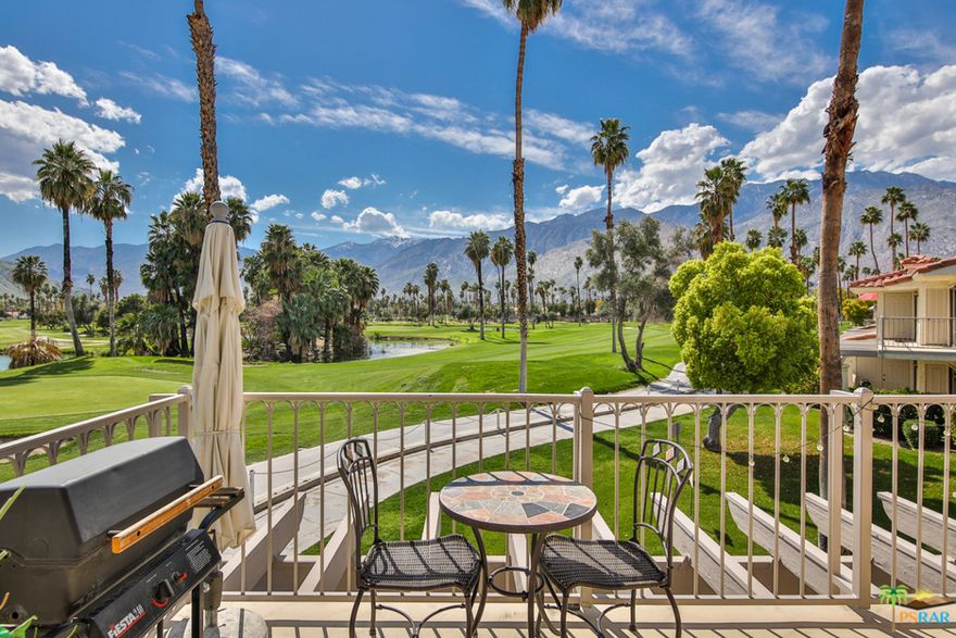 One-of-a-kind LOCATION in Mesquite Country Club! Be welcomed by stunning, unobstructed, 180 degrees of fairway, lakes, palm trees and mountain views. This unit is situated in the upper corner, end building; what separates it from other units is the unending views with privacy. 2BD/2BA turnkey furnished. Good separation of bedrooms (each with their own balconies) & baths! You'll never be too far away from mountain views as each window and balcony will give you spectacular views. Newer air conditioning for those warmer summer months and comes equipped with stylish ceramic floors from kitchen to living room. Great natural light. The home belongs to a safe, well kept, gated community where you will find a swimming pool seconds from the door, hot tubs, adjoining golf course/driving range, and tennis courts. Close to downtown Palm Springs, library, casinos & shopping! This upper unit would make a popular rental (7 day minimum) or incredible place to enjoy endless sunrises and sunsets!
