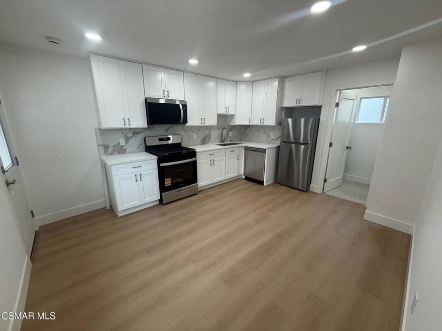 Brand-New 1 Bedroom, 1 Bathroom Junior ADU with Large Patio in the Heart of Thousand OaksBe the first to live in this stunning, newly built single-story Junior ADU! Featuring a bright and open layout, this 1-bedroom, 1-bath home offers modern comfort and style throughout. The full kitchen boasts new stainless steel appliances, quartz countertops, a full backsplash, and abundant cabinet storage. Enjoy the convenience of a full-sized washer and dryer, a luxurious bathroom with a spacious walk-in shower and frameless glass door, and new luxury vinyl flooring throughout.The generous bedroom includes a walk-in closet, and additional highlights include solid-core doors and a new mini-split system for efficient heating and cooling. Step outside to a large private patio--perfect for relaxing or entertaining. Located on a quiet, tree-lined street in a safe neighborhood with easy freeway access.(Note: Kitchen wall is shared with the main house's kitchen and dining room.) The owner plans on painting the eaves house in the near future.