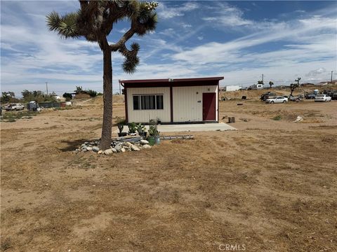Photo of 11551 Cactus DR, Phelan, CA 92371 (MLS # IV26099397)
