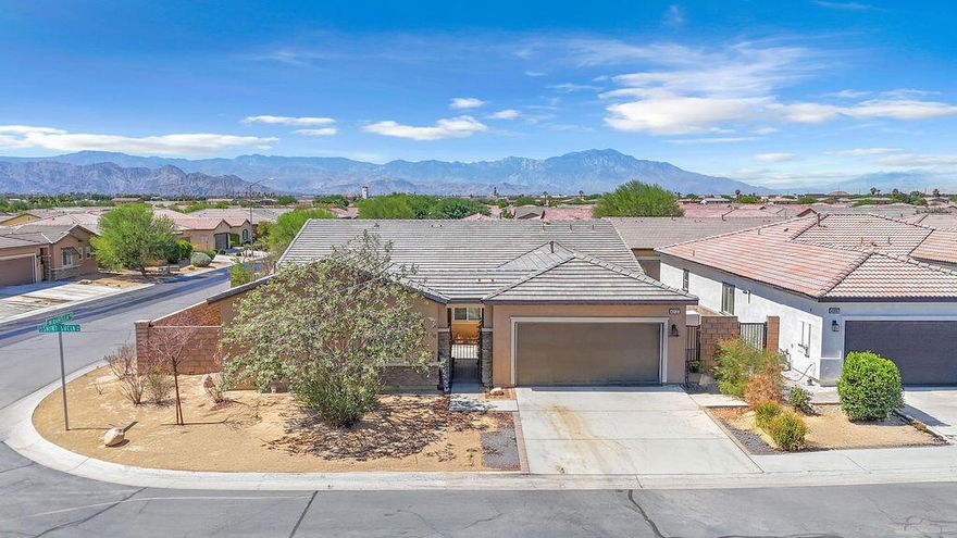 This spacious home is now vacant and priced to sell quickly in the highly sought-after gated Haciendas community of North Indio. Offering a flexible floor plan and over four bedrooms of living space, it's perfect for multi-generational living, guests, or a home office setup.The main home features three bedrooms and two bathrooms, a large formal dining room, and a beautifully upgraded kitchen with white cabinetry and granite countertops, Throughout the home, you'll find laminate flooring, recessed lighting, and an abundance of natural light.A standout feature is the enormous attached casita with its own private entrance, living room, bedroom and bathroom, plus a kitchenette with cabinets, granite countertop, sink, mini refrigerator, and a utility closet with washer/dryer hookups -- ideal for guests, extended family, or rental potential.Additional highlights include a slider off the kitchen leading to the backyard, a large laundry room with extra storage, a two-car garage, and a covered entry with a gated courtyard.
