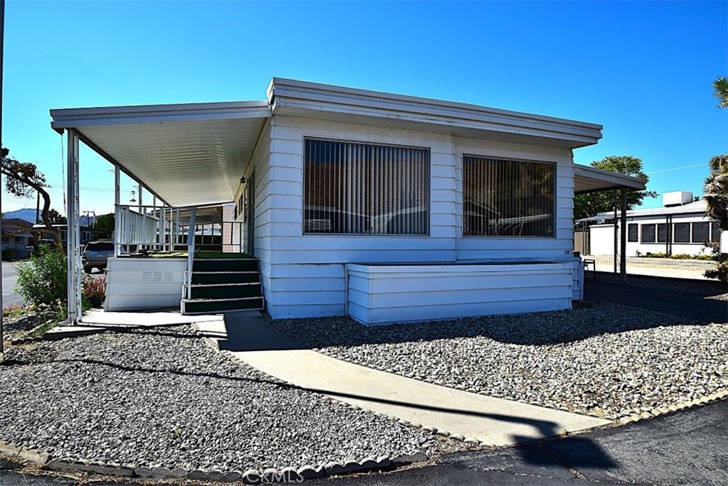 Living in a senior park in Yucca Valley offers a peaceful and supportive environment tailored to the needs of older adults. The double-wide mobile home provides a manageable living space with access to community amenities and a beautiful desert setting. The layout includes two separate bedrooms, 1 bathroom, providing privacy and convenience, living room, dining area, laundry room. In such a mobile home, residents can enjoy the benefits of independent living while being part of a community specifically tailored to seniors. Senior parks often offer amenities and services catered to the needs and preferences of older adults, such as recreational facilities, social activities, and sometimes even healthcare services.
