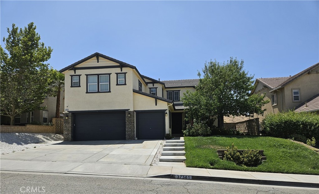 Discover this beautifully updated 5-bedroom, 3-bath home with a den and 3-car garage in the prestigious Anaverde community. The spacious layout includes one bedroom and full bathroom downstairs, a large kitchen with granite countertops, walk-in pantry, center island, and plenty of cabinets, plus a freshly painted formal dining area and living room with fireplace and laminate flooring throughout the rooms.
Upstairs features four bedrooms, two bathrooms, a loft with a mini bar, and a laundry room with a sink and storages. The master suite includes a private balcony, oversized walk-in closet, and an in-suite bath with soaking tub, separate shower, and double vanity.
Additional features include dual A/C units, an ADT security system (tenant activated), a smart garage door with camera, EV charger with two stations (eligible for reduced electric rates), and all major appliances—refrigerator, microwave, oven, range, dishwasher, washer, and dryer. The home has a newly painted exterior, refreshed landscaping, and is located in a quiet, safe community.