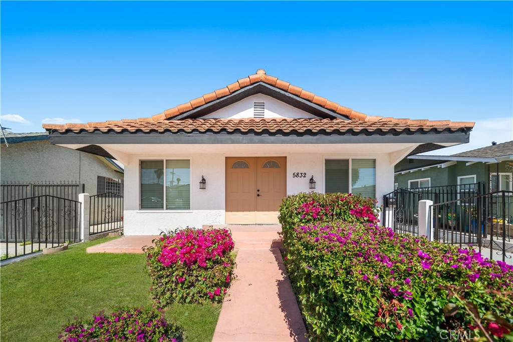 Welcome to 5832 6th Ave-this beautifully reimagined home captures the essence of comfortable living while embracing modern updates. Originally built in 1927 and thoughtfully refreshed in 2025. This home features 5-bedroom, 4 and a half bath, offering 2,845 SqFt living space. Sunlight streams through larger windows creating an airy, welcoming atmosphere. The open-concept floor plan seamlessly connects living room, family room, and dinning area. Off the kitchen, featuring granite countertops, stainless steel appliances, and plenty of cabinets. 2-bedrooms downstairs with their en-suite bathrooms. Upstairs, there are total of 3- bedroom and 2-bathroom. A detached two-car garage, along with the long driveway, offers plenty of parking space. This move-in ready home boasts brand-new flooring, new windows, smooth ceilings with recessed lighting, and fresh paint throughout. Easy commute to Downtown Los Angeles, Sofi Stadium, Intuit Dome, the Forum, and LAX.